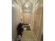 Hallway with ceramic tile floor and light fixture at 5954 Honeywell Dr, Indianapolis, IN 46236