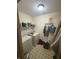 Laundry room featuring white washer and dryer with linoleum floor tiles and shelf at 5954 Honeywell Dr, Indianapolis, IN 46236