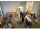 Living room area with large windows, ladder, and boxes at 5954 Honeywell Dr, Indianapolis, IN 46236