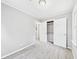 Cozy bedroom with neutral walls, plush carpet, and a closet, creating a peaceful retreat at 602 W 34Th St, Anderson, IN 46013