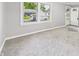 Spacious, freshly painted living room, featuring new carpeting at 602 W 34Th St, Anderson, IN 46013