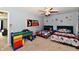 bedroom features two twin beds, basketball themed decor, and a fun play table at 6126 Navy Cir, Indianapolis, IN 46221