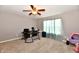 Bedroom showcasing a ceiling fan, and natural light that illuminates the cozy carpeting at 6126 Navy Cir, Indianapolis, IN 46221
