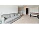Game room with a comfortable couch, foosball table and a clear view of the staircase at 6126 Navy Cir, Indianapolis, IN 46221