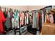 Walk-in closet with ample hanging space, shelving, and some storage solutions at 6126 Navy Cir, Indianapolis, IN 46221