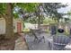 Backyard features a charming deck with outdoor seating, ideal for relaxing or entertaining guests at 6142 Evanston Ave, Indianapolis, IN 46220