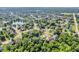 Beautiful aerial view of a community with ponds and mature trees at 6374 Timberbluff Cir, Avon, IN 46123