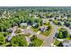 Aerial view of a suburban neighborhood with mature trees and well-maintained homes at 6374 Timberbluff Cir, Avon, IN 46123