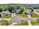 Stunning aerial view of the home nestled in a serene neighborhood with lush greenery at 6374 Timberbluff Cir, Avon, IN 46123