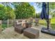 Spacious back deck featuring comfortable patio furniture and shade umbrella at 6374 Timberbluff Cir, Avon, IN 46123
