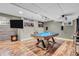 Entertainment room with a pool table, TV, and projector for fun at 6374 Timberbluff Cir, Avon, IN 46123