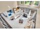 Bright and airy living room features soaring ceilings, fireplace, and elegant furnishings at 6374 Timberbluff Cir, Avon, IN 46123