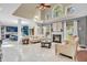 Open-concept living room with modern finishes, a fireplace, and backyard views at 6374 Timberbluff Cir, Avon, IN 46123