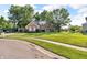View of home from the street with a sidewalk and a lush green lawn at 6374 Timberbluff Cir, Avon, IN 46123