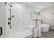 This bathroom features an elegant shower with a built-in seat and a soaking tub at 6553 Stone Pointe Way, Indianapolis, IN 46237