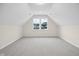 Spacious bedroom features neutral walls and carpet with lots of natural light from the windows at 6553 Stone Pointe Way, Indianapolis, IN 46237