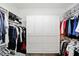Walk-in closet featuring custom shelving and ample storage space at 6570 Freemont Ln, Carmel, IN 46033