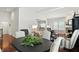 Inviting dining area with natural light and views of the living room at 6570 Freemont Ln, Carmel, IN 46033