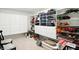 Organized storage room featuring built-in cabinets, shelving, and decorative items at 6570 Freemont Ln, Carmel, IN 46033