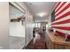 Foyer entrance features a sliding barn door and a view into the living room at 6664 Kara Ln, Brownsburg, IN 46112