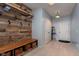 Hallway featuring custom wood storage and seating at 6664 Kara Ln, Brownsburg, IN 46112