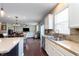 Bright kitchen with stainless steel appliances, tile backsplash and an open design at 6664 Kara Ln, Brownsburg, IN 46112