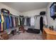 Spacious walk-in closet with ample hanging space, shelving, and organizers for clothing and accessories at 6664 Kara Ln, Brownsburg, IN 46112