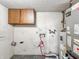 Unfinished basement space with cabinets and utilities, ready for customization at 6739 Westdrum Rd, Indianapolis, IN 46241