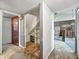 Hallway featuring an open closet with shelves and access to adjacent rooms at 6739 Westdrum Rd, Indianapolis, IN 46241