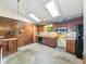Vintage kitchen featuring wood cabinetry and a skylight, offering a unique and nostalgic charm at 6739 Westdrum Rd, Indianapolis, IN 46241