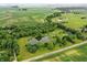 An aerial photograph of the surrounding farm fields and a beautiful pond at 750 N 500 W, Lebanon, IN 46052