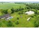 Beautiful land with a pool, pond, and various outbuildings, creating a private retreat at 750 N 500 W, Lebanon, IN 46052