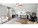 Comfortable living space featuring a ceiling fan and versatile layout perfect for use as a bedroom, study, or media room at 750 N 500 W, Lebanon, IN 46052