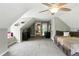 Spacious bedroom with ceiling fan and neutral decor features a dormer window and versatile layout for relaxation and comfort at 750 N 500 W, Lebanon, IN 46052
