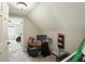 Cozy room featuring a drum set, keyboard, and doorway leading to a bedroom with natural light at 750 N 500 W, Lebanon, IN 46052