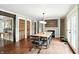 Bright dining area with wood floors and access to the patio via french doors at 750 N 500 W, Lebanon, IN 46052