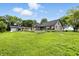 A spacious backyard with a gray house is perfect for entertaining at 750 N 500 W, Lebanon, IN 46052