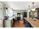 Modern kitchen with updated appliances, a farmhouse sink, and plenty of counter space for meal preparation at 750 N 500 W, Lebanon, IN 46052