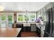 Stylish kitchen with ample natural light, modern appliances, and a view of the backyard and pool at 750 N 500 W, Lebanon, IN 46052