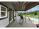 A patio offers a view of the pool and backyard at 750 N 500 W, Lebanon, IN 46052