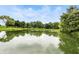 Peaceful pond view reflecting surrounding trees and sky, providing a serene atmosphere at 750 N 500 W, Lebanon, IN 46052