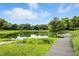 Picturesque pond with a wooden dock, perfect for relaxing and enjoying nature at 750 N 500 W, Lebanon, IN 46052