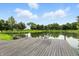 Relaxing pond view with two chairs set at the end of the dock at 750 N 500 W, Lebanon, IN 46052