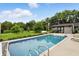A sparkling backyard pool with sundeck offers cool relief at 750 N 500 W, Lebanon, IN 46052