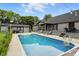 A sparkling backyard pool with sundeck offers cool relief at 750 N 500 W, Lebanon, IN 46052