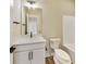 Bathroom featuring white vanity, modern fixtures, and a shower-tub combination at 7604 Brownstone Ct, Greenfield, IN 46140
