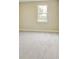 Bedroom with carpet and a view from the window at 7604 Brownstone Ct, Greenfield, IN 46140