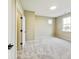 Spacious bedroom featuring soft gray carpet and a window for natural light at 7604 Brownstone Ct, Greenfield, IN 46140