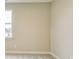 Bright bedroom has neutral-toned walls and trim, and a window allowing natural light at 7604 Brownstone Ct, Greenfield, IN 46140