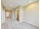 Spacious hallway featuring plush carpet and multiple doorways leading to various rooms at 7604 Brownstone Ct, Greenfield, IN 46140